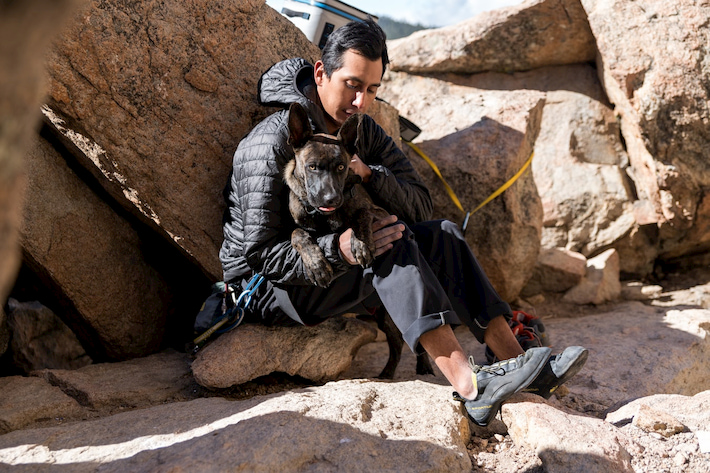 owner and his dog hugging