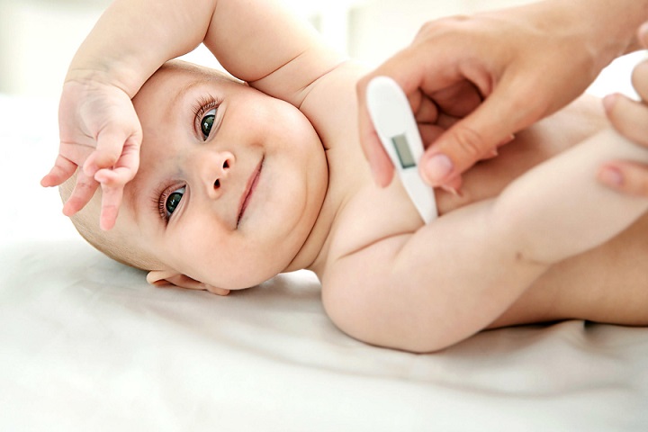 picture of baby with thermometer