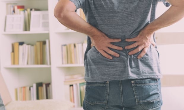 man experiencing back pain