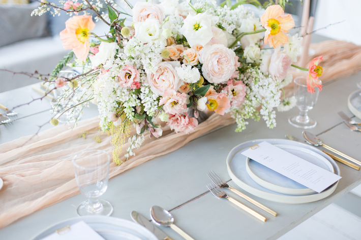 spring wedding centrepiece with pastel roses