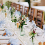 wedding table with flower centerpieces