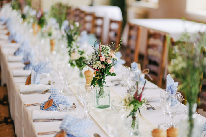 wedding table with flower centerpieces