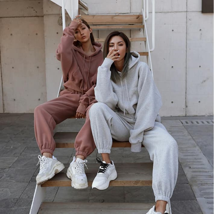 2 girls in tracksuit sets