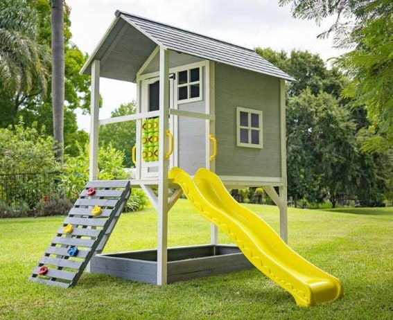 Wooden cubby house with slide