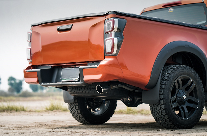 Back view of red Isuzu DMax