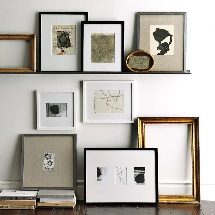 art in frames on a wall