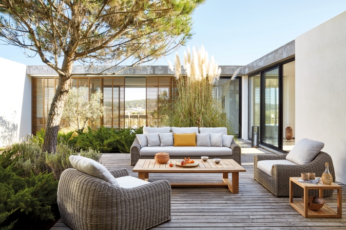 a patio with outdoor furniture