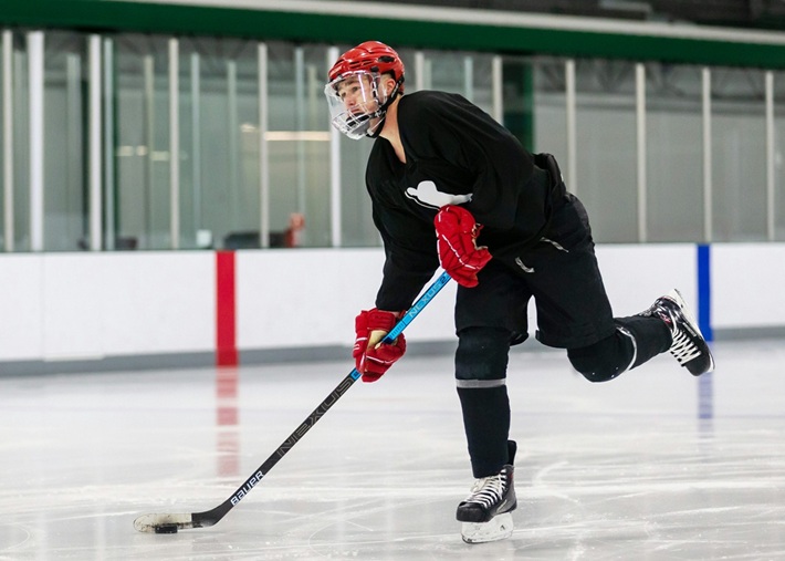 player with a Bauer hockey stick