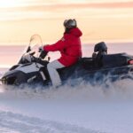 man on snowmobile